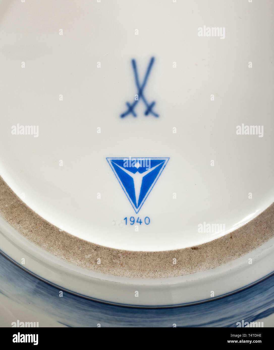 A large Meissen vase from the Junkers factory, 1940, White porcelain with cobalt blue decoration, a thin silver band below the rim. A Ju 90 (D-AURE) and a Ju 88 in the midst of surrounding clouds above mountains each on one of the viewing sides. Blue sword mark, the company logo 'Junkers 1940' and a scratched number 'P.249' on the bottom. Height 43 cm. Prestigious vase in good to very good condition. Air Force, branch of service, branches of service, armed service, armed services, military, militaria, air forces, object, objects, stills, clipping, clippings, cut out, cut-ou, Editorial-Use-Only Stock Photo