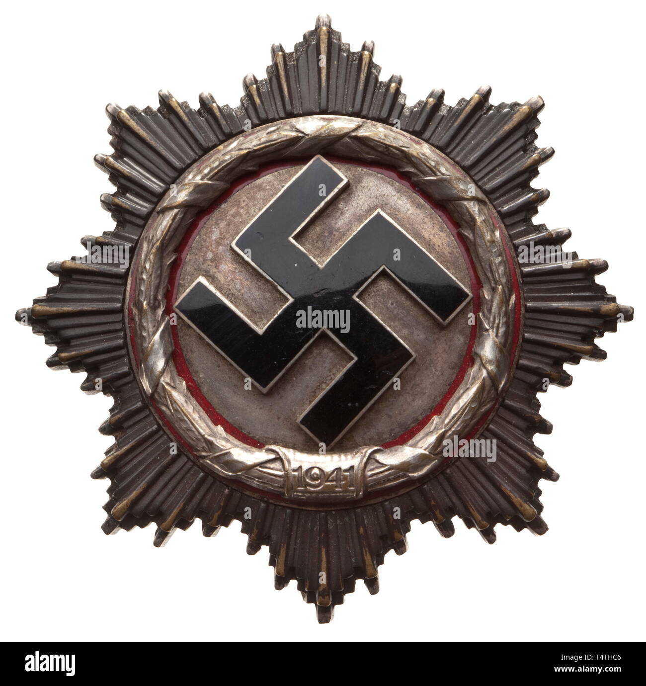 A German Cross in Silver. Heavy, non-punched issue of maker Deschler, Munich, with four rivets and applied attachment pin system with long, slightly bellied pin. Tarnished, light signs of use (Nie 7.04.12). historic, historical, awards, award, German Reich, Third Reich, Nazi era, National Socialism, object, objects, stills, medal, decoration, medals, decorations, clipping, cut out, cut-out, cut-outs, honor, honour, National Socialist, Nazi, Nazi period, 20th century, Editorial-Use-Only Stock Photo