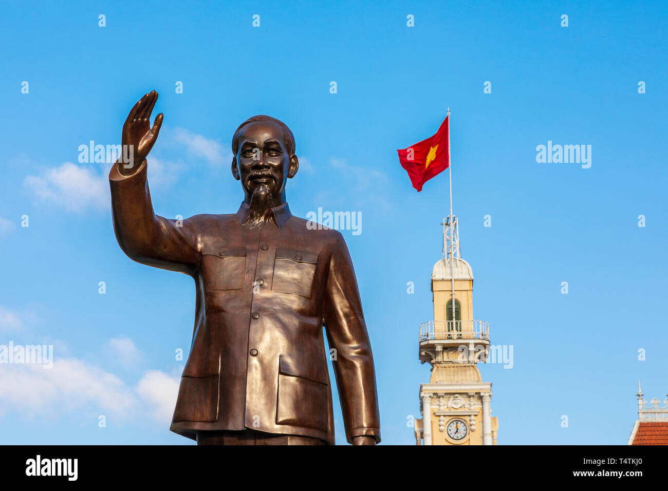 Statue of Ho Chi Minh at the northern end of Nguyen Hue Boulevard, outside the Hotel de Ville (city halls) a French designed neo-baroque building now  Stock Photo