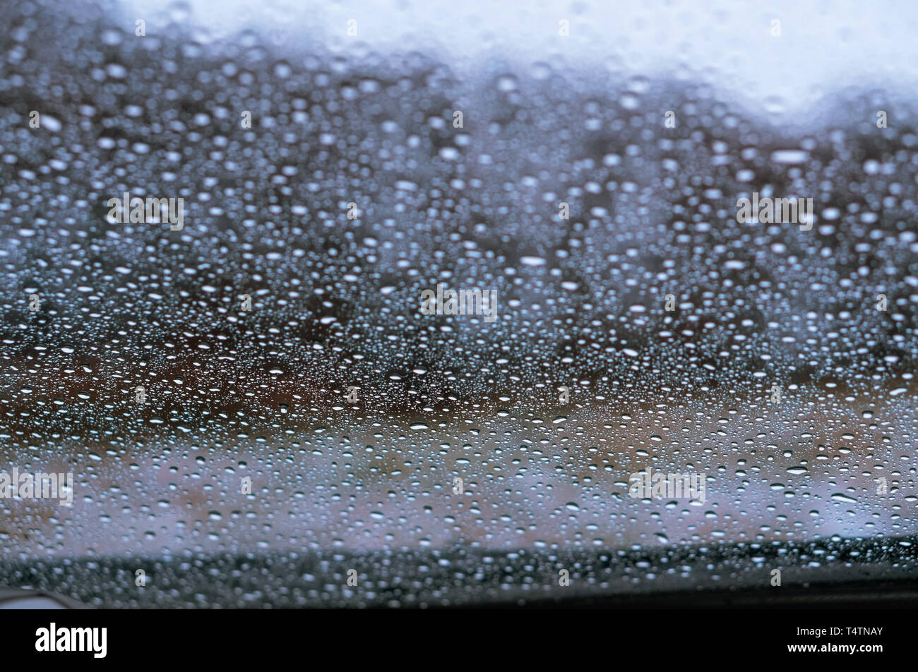 water drops on car glass, rain drops on glass Stock Photo