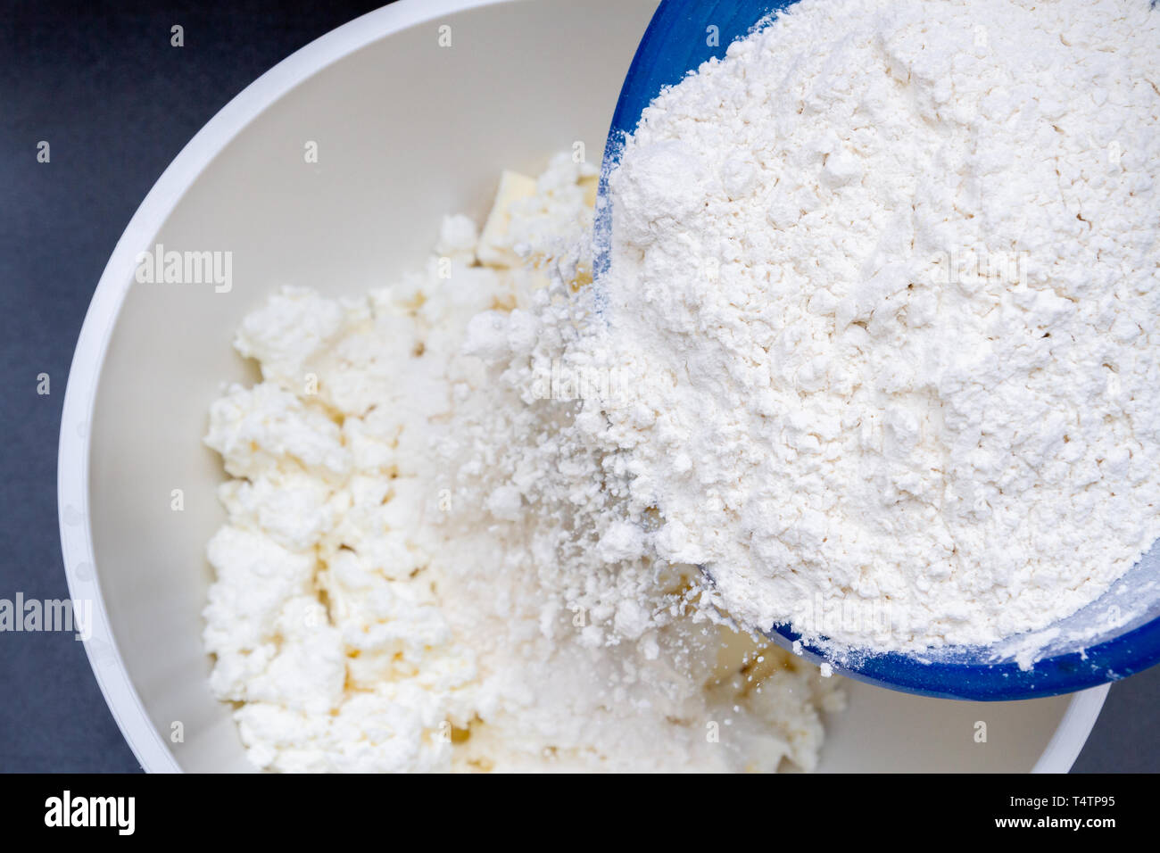 In A Bowl With Ingredients Butter And Cottage Cheese For Biscuits