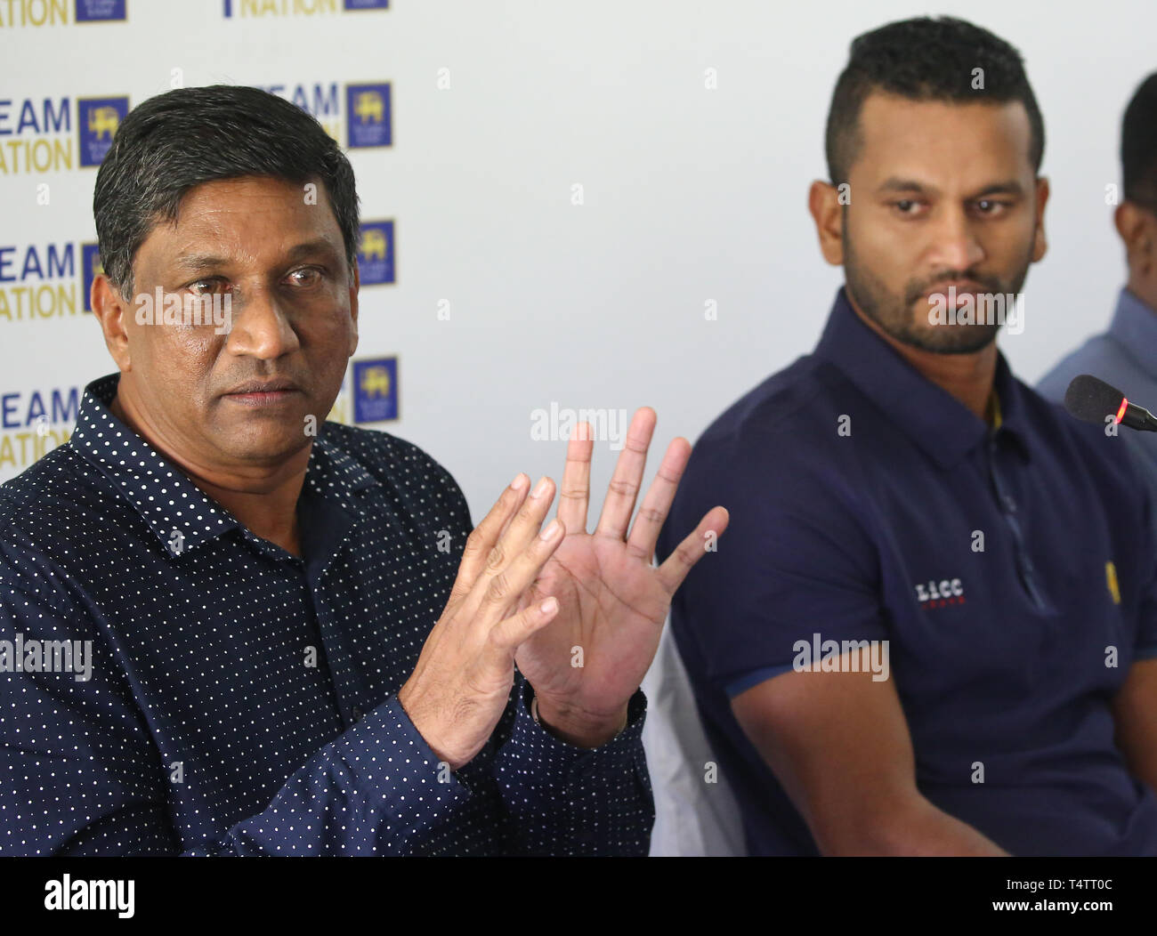 Colombo, Sri Lanka. 18th Apr, 2019. Sri Lanka's Cricket chairman of selector Ashantha de Mel (L) speaks as newly appointed captain (ODI) Dimuth Karunaratne (C) looks on during a press conference Colombo, Sri Lanka, Thursday, 18 April, 2019. Sri Lanka on April 18 dumped established stars including former captain Dinesh Chandimal from their one-day team in a mass clearout for the World Cup. Credit: Pradeep Dambarage/Pacific Press/Alamy Live News Stock Photo
