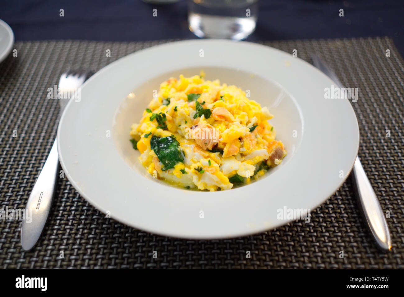Salmon, spinach and cheese scrambled eggs Stock Photo Alamy