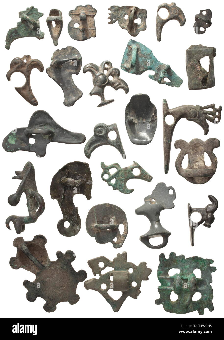 A large assortment of Scythian fittings, 5th/4th centuries BC. Bronze with fine patina in various shades of green. 25 fittings, partially in characteristic, stylised animal shapes. Provenance: South German private collection, 1970s and later. historic, historical, ancient world, ancient times, Greek, Hellas, ancient world, Additional-Rights-Clearance-Info-Not-Available Stock Photo