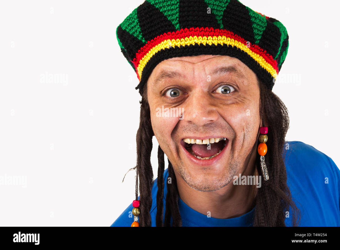 A crazy man with dreadlocks wig Stock Photo