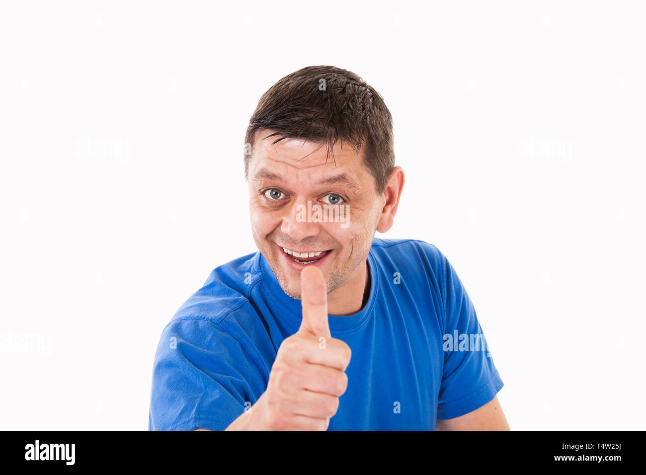 A man with his thumb pointing upwards - isolated Stock Photo