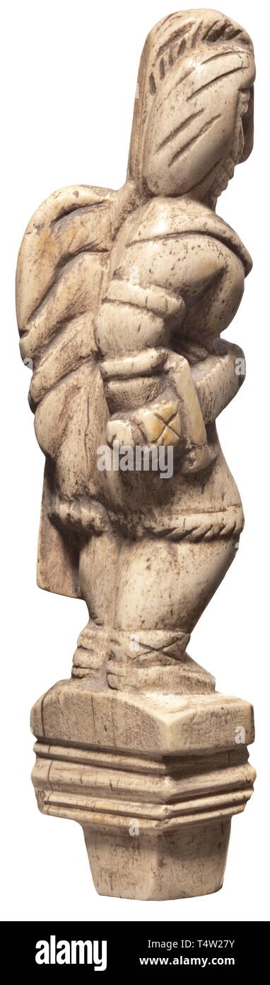 A Roman carved bone figure of a gladiator, 2nd/3rd century AD. Standing detailed figure with helmet, sword and shield on a stepped base. Intact. Overall height 8.4 cm. Provenance: South German private collection, 1970s and later. historic, historical, Roman Empire, ancient world, ancient times, ancient world, Additional-Rights-Clearance-Info-Not-Available Stock Photo