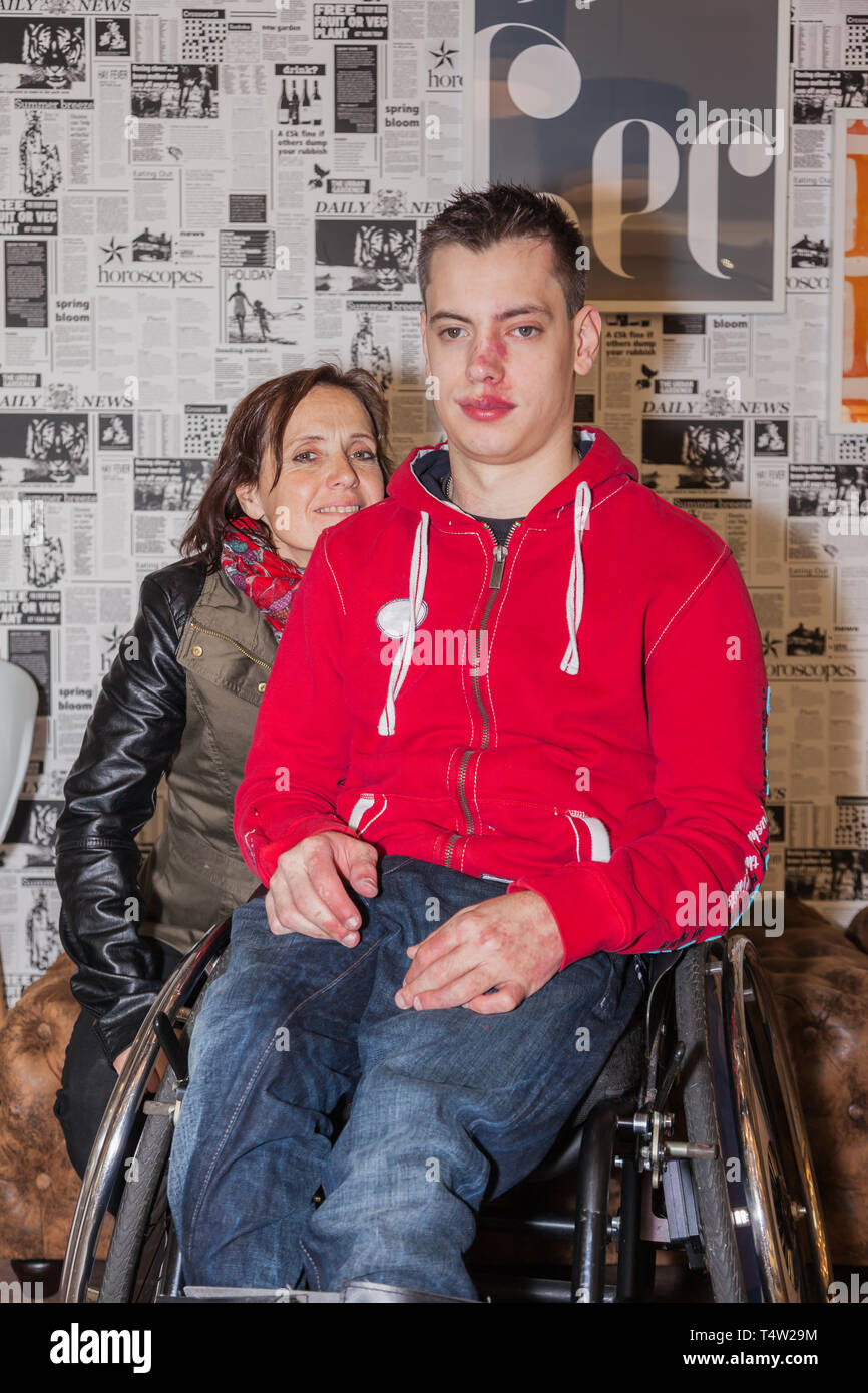 Mother with handicapped son Stock Photo