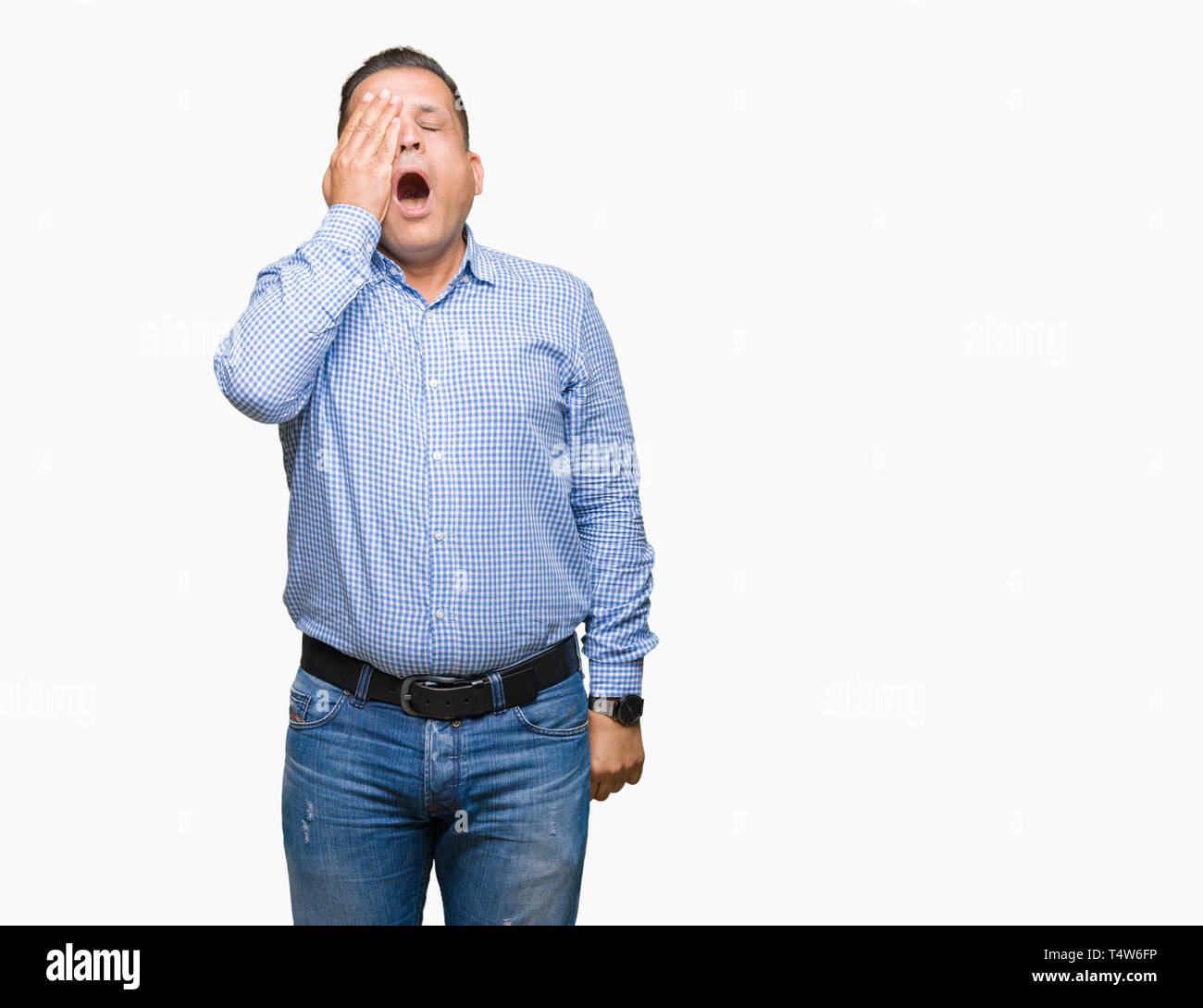 Middle age arab business man over isolated background Yawning tired