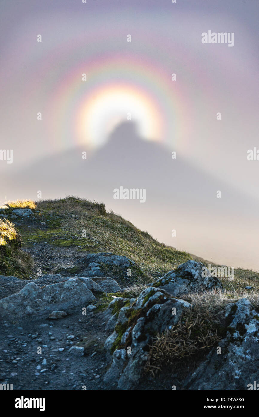 Double brocken spectre from mountain summit Stock Photo