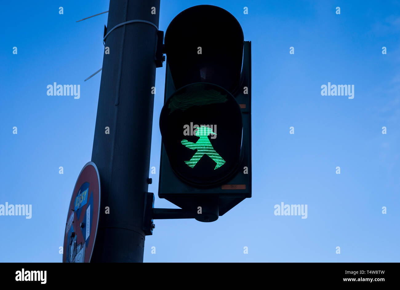 Green Ampelmann on a pedestrian crossing in Berlin, Germany. Stock Photo