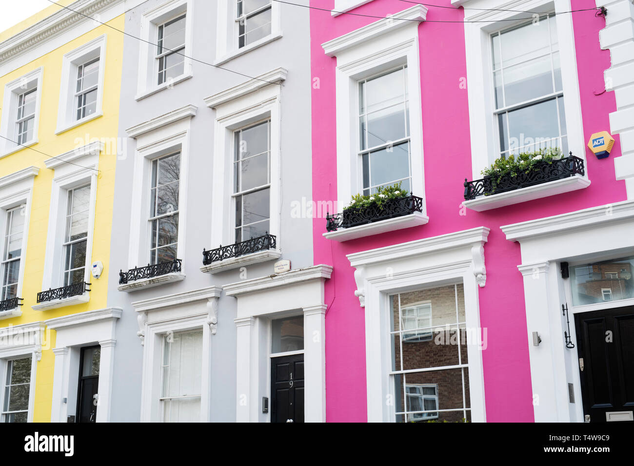 Colourful terraced houses in Denbigh Terrace, Notting Hill, London, England Stock Photo