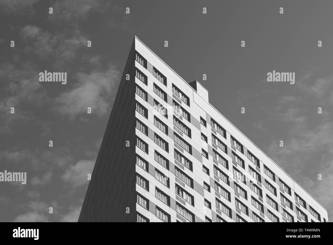 Angle of the Skyscraper on the Cloudy Sky Background. Black and White ...