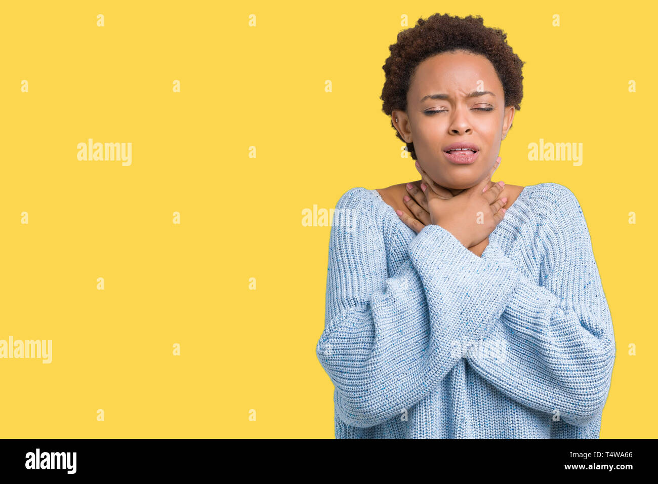 Young beautiful african american woman wearing a sweater over isolated ...