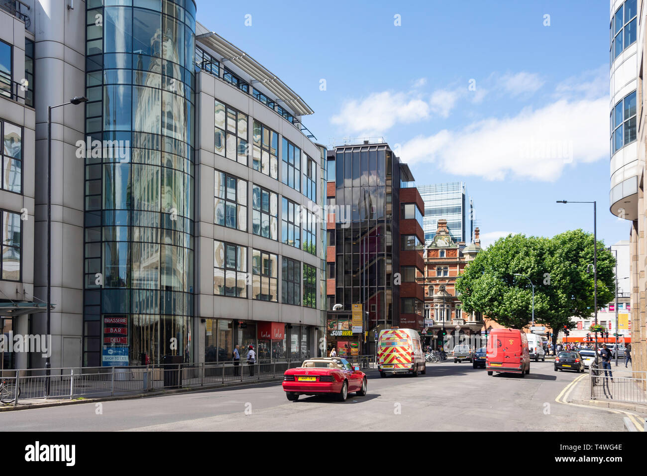 Broadway office buildings street traffic high rise queen carolin hires