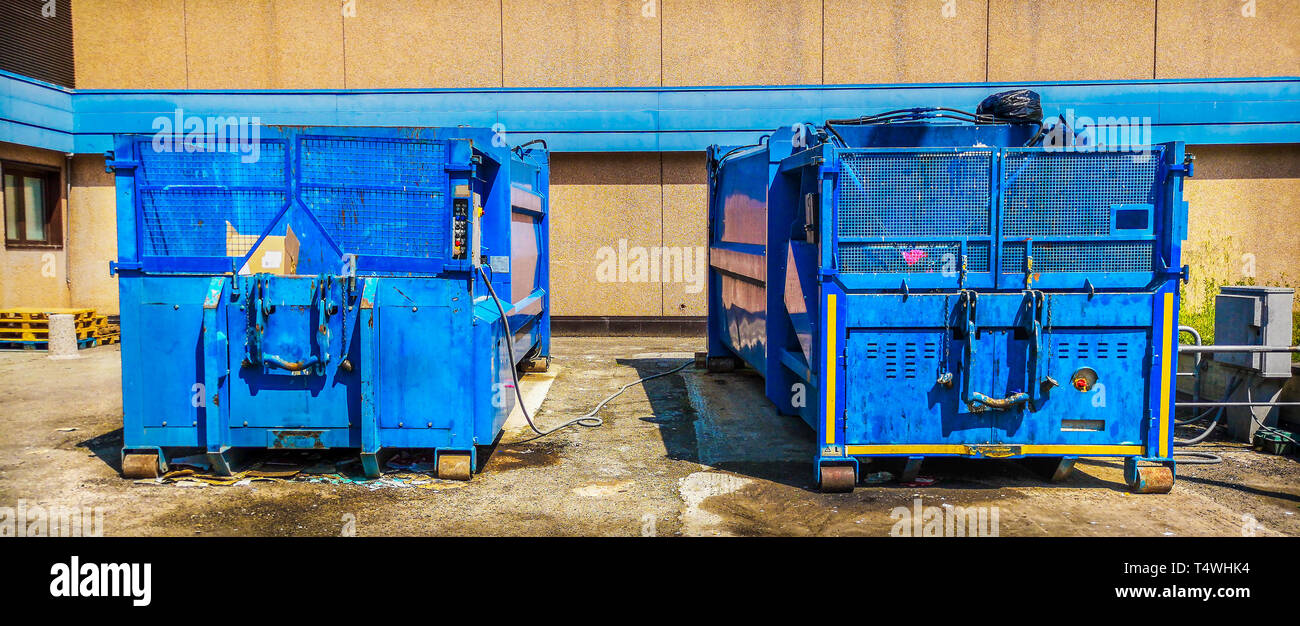 press container waste compressor of industrial garbage . Stock Photo