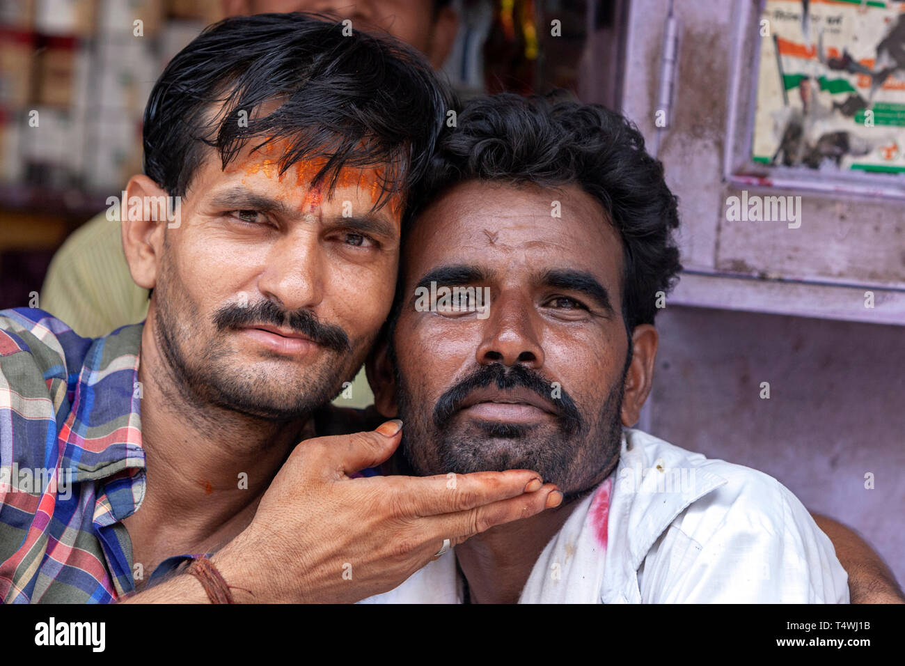 Two rajasthani friends poses for a funny photo in Bundi Market, Bundi,  Rajasthan state, India Stock Photo - Alamy
