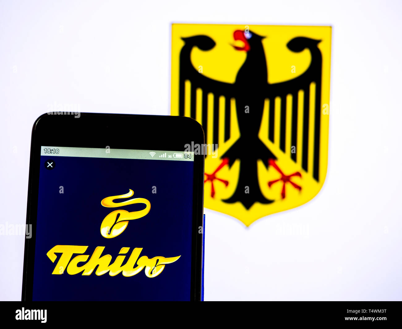 In this photo illustration a Tchibo (part of Maxinvest) logo seen displayed  on a smart phone Stock Photo - Alamy