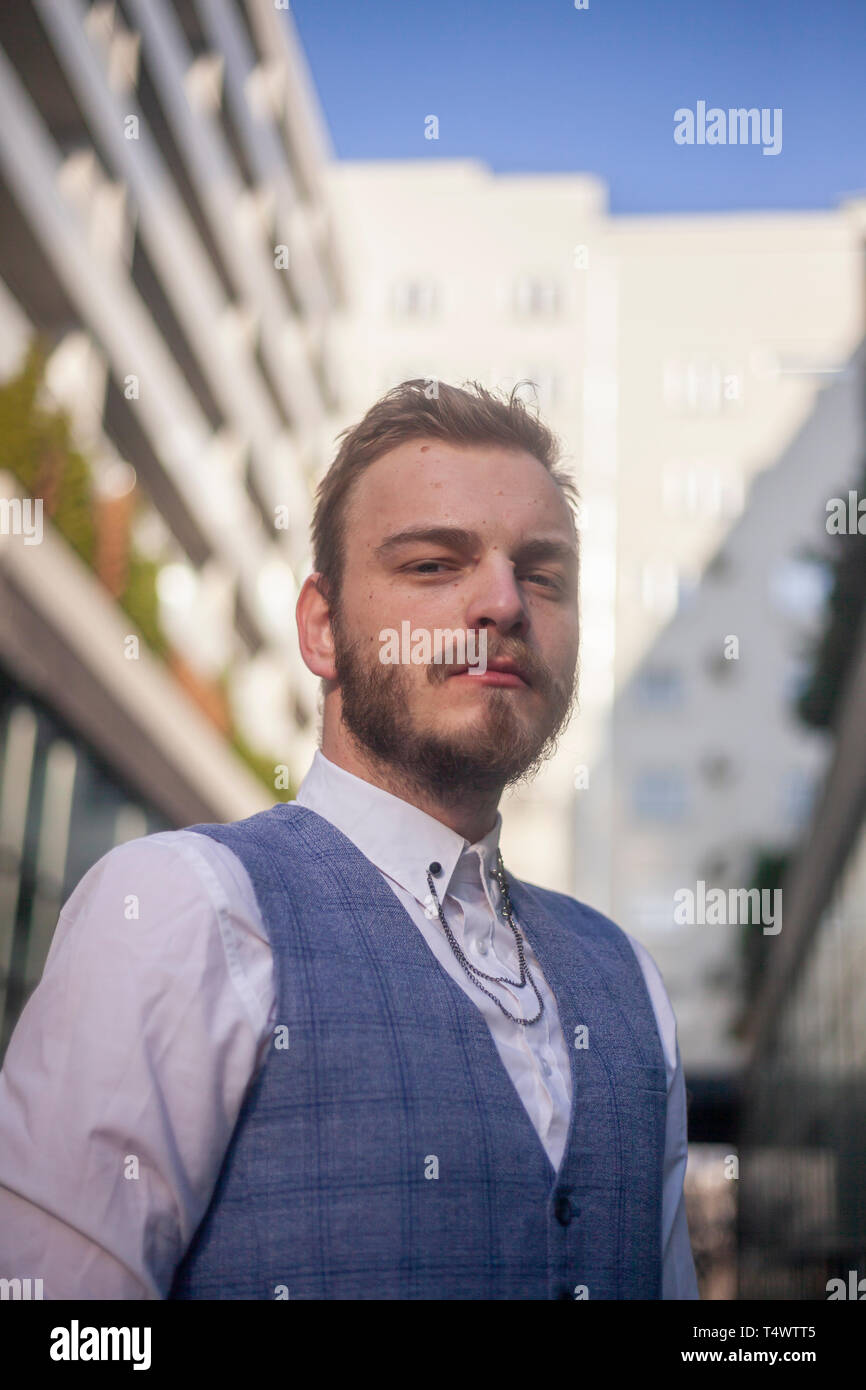 One Young Businessman Seriously Looking To Camera From Above Low Angle Shot Stock Photo Alamy One Young Businessman Seriously Looking To Camera From Above Low Angle Shot Stock Photo Alamy