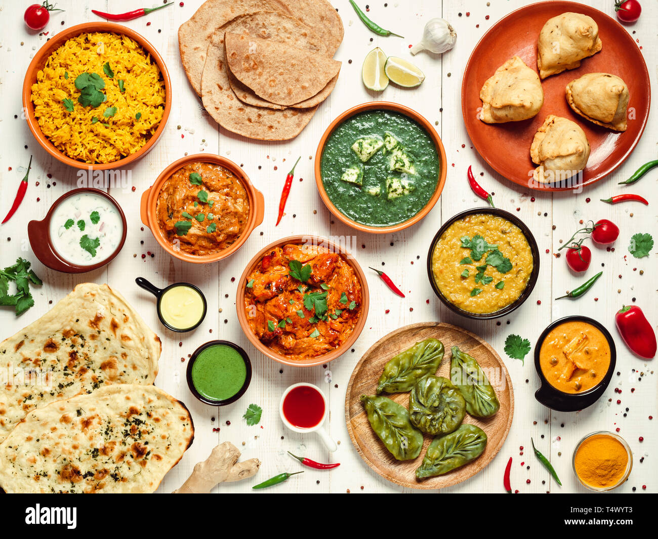 Indian cuisine dishes tikka masala, dal, paneer, samosa, chapati, chutney, spices. Indian food