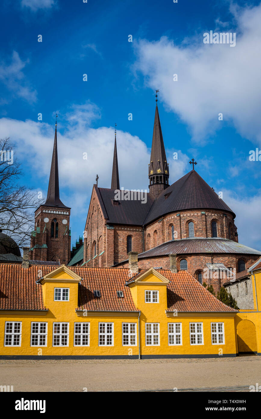 Roskilde cathedral, a UNESCO-listed Gothic building and adjacent 18th century Roskilde Palace, Roskilde, historic town on the island of Zealand, west  Stock Photo