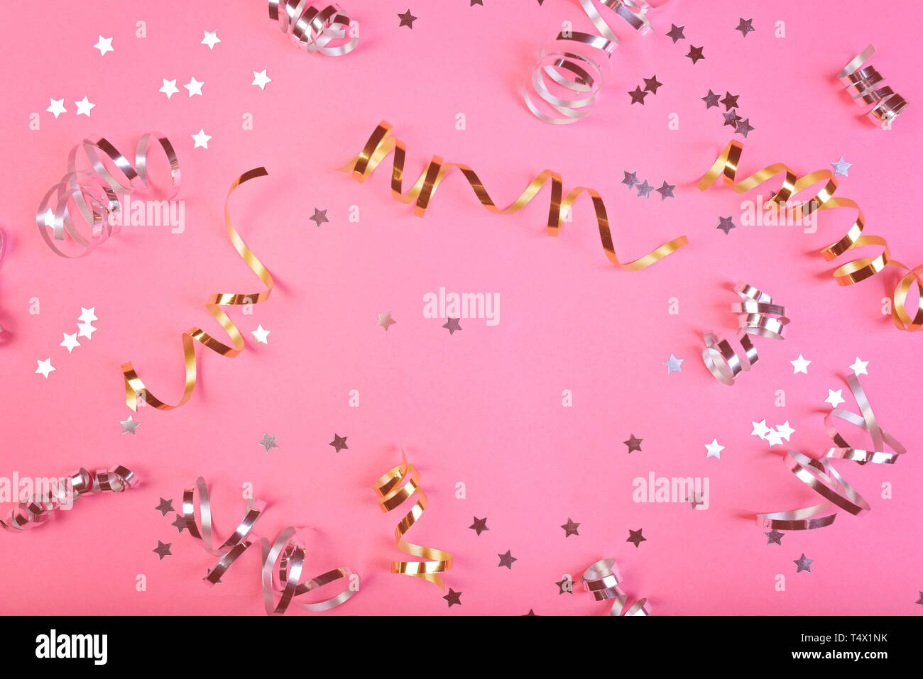 Background about a party, confetti, stars and streamers. Stock Photo
