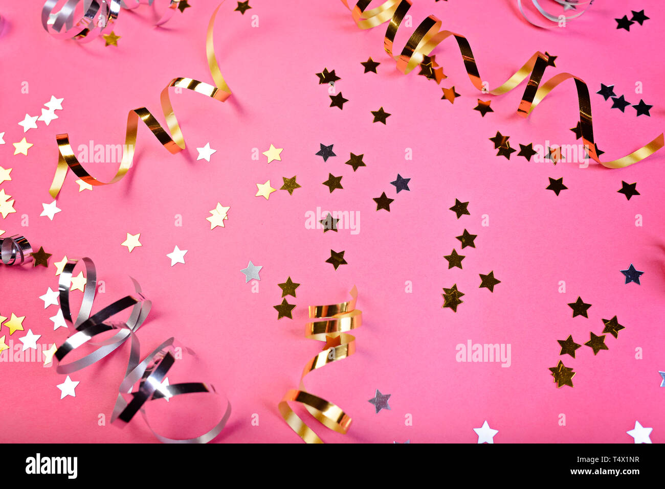 Background about a party, confetti, stars and streamers. Stock Photo