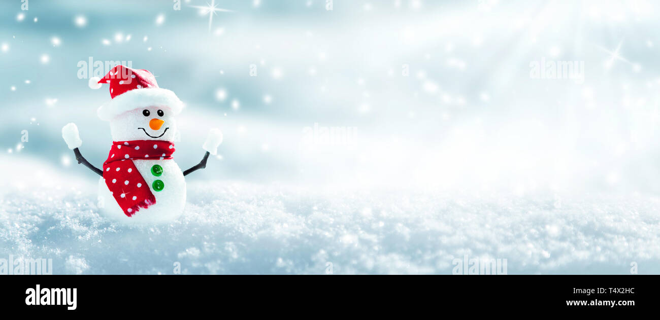 Snowman In Snowy Winter Wonderland Stock Photo