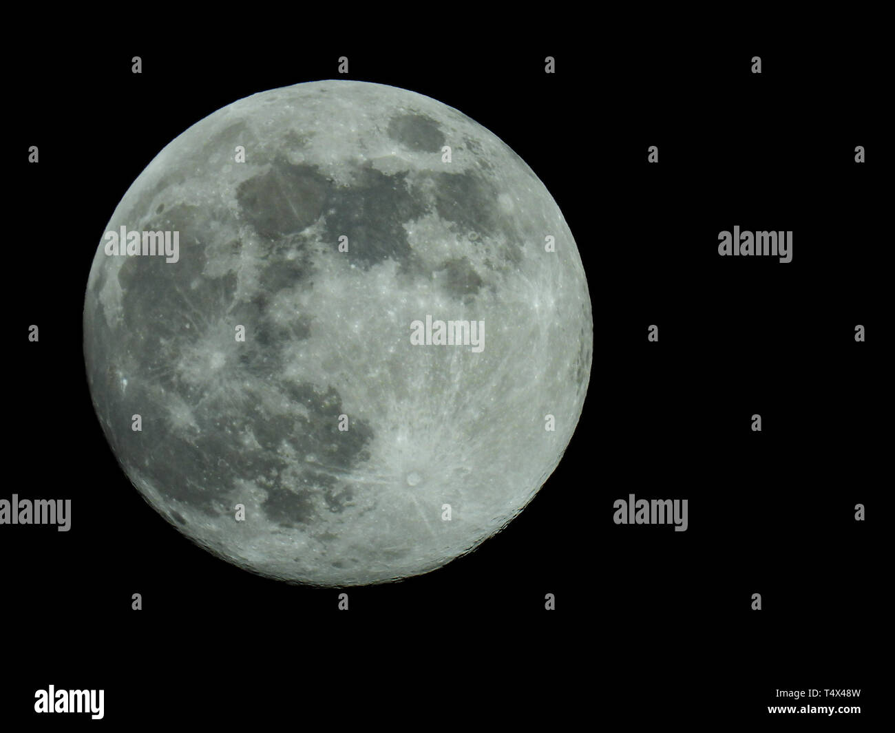 a full moon in the starry night sky Stock Photo - Alamy