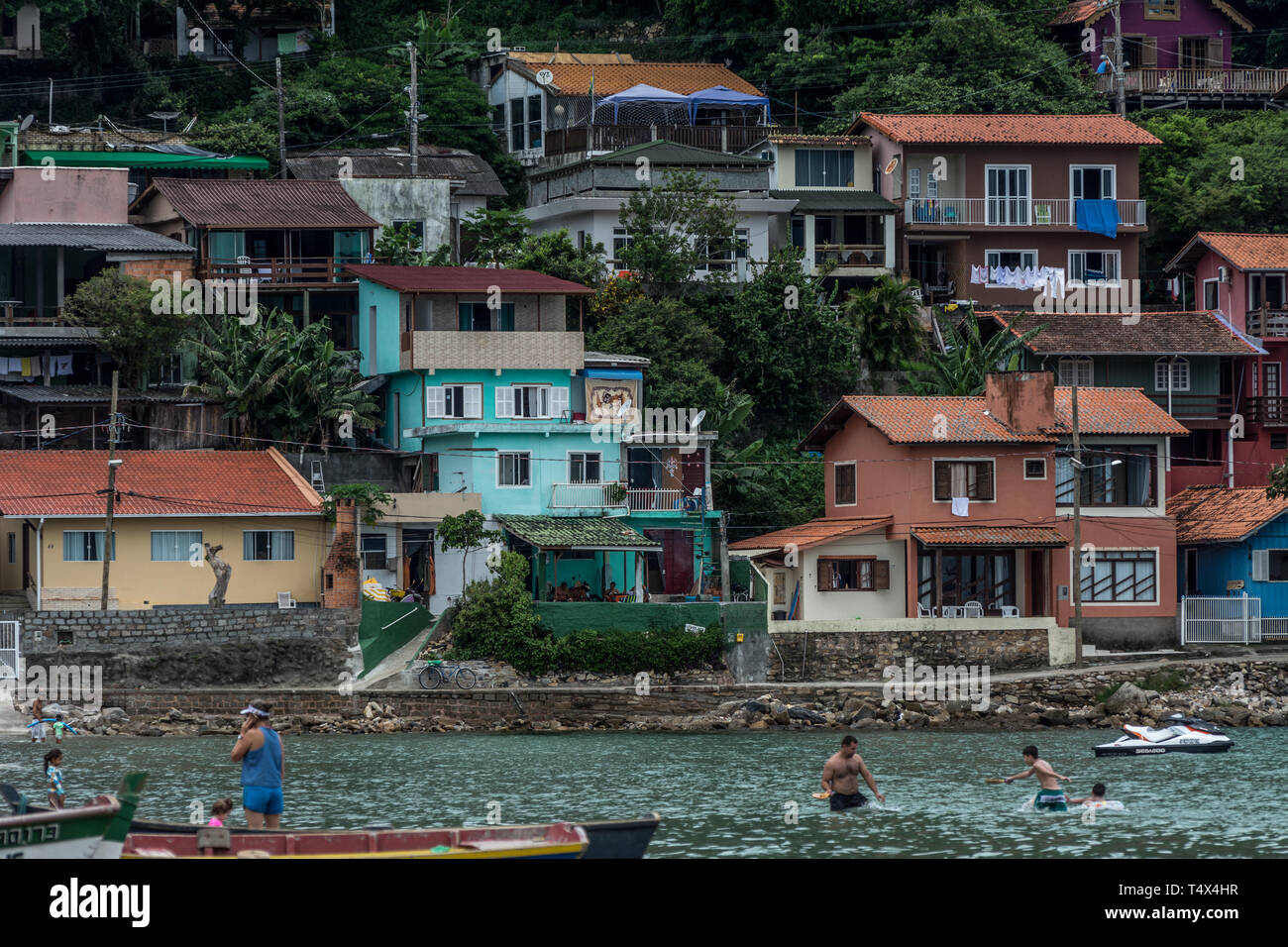 2019, January. Florianopolis, Brazil. Confortable houses at the hillside near the Pantano do Sul Beach. Stock Photo