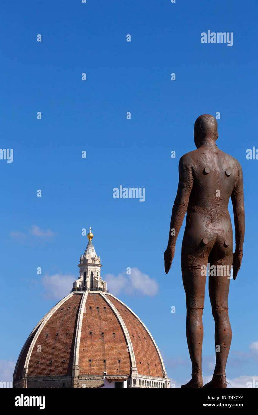 Event Horizon,  2012,  Antony Gormley,  sculpture stands on Uffizi Cafe Gallery, looking to Filippo Brunelleschi's dome, the Duomo, Essere Exhibition, Stock Photo