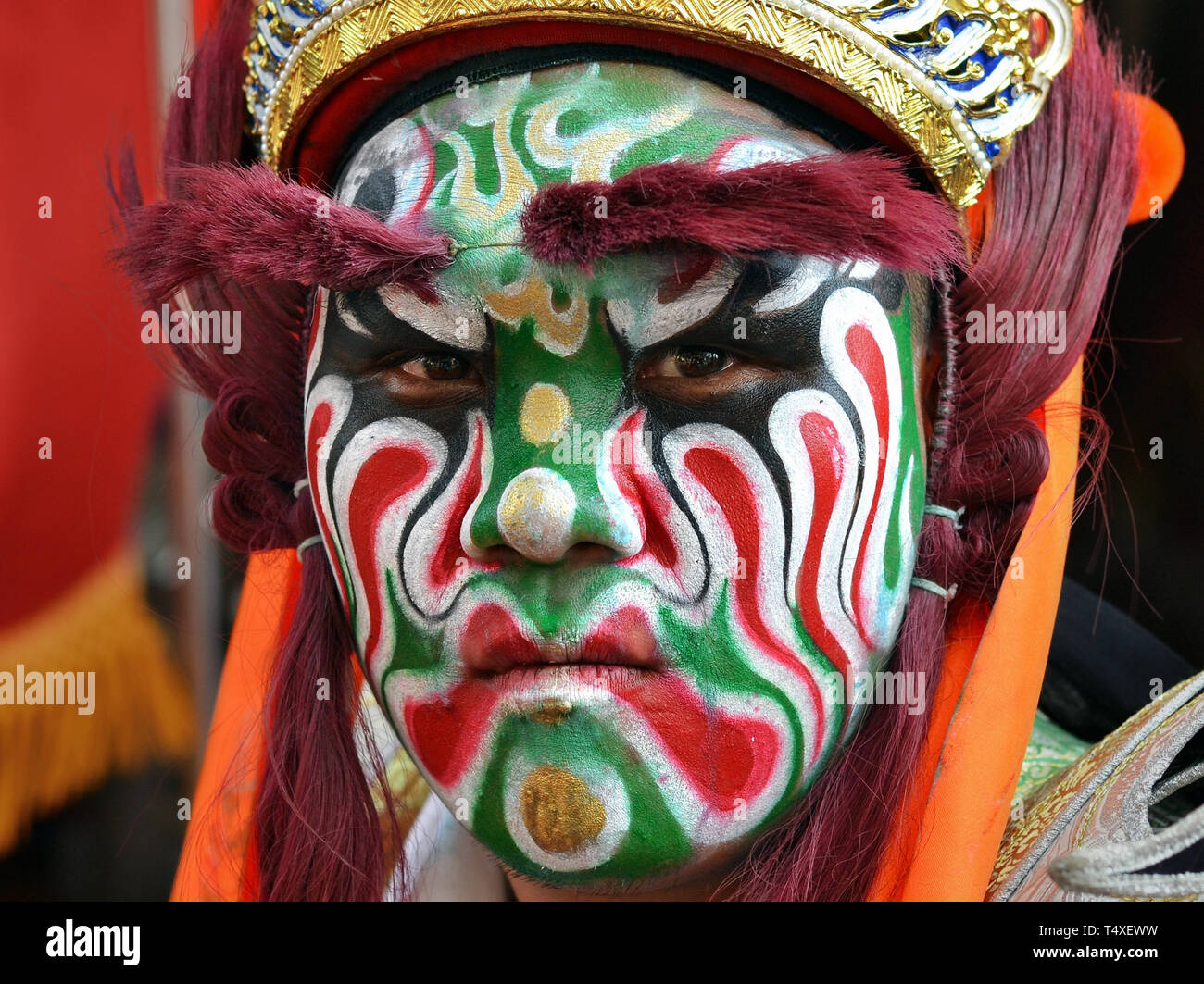 Young Taiwanese man (street performer of a zhentou troupe during a