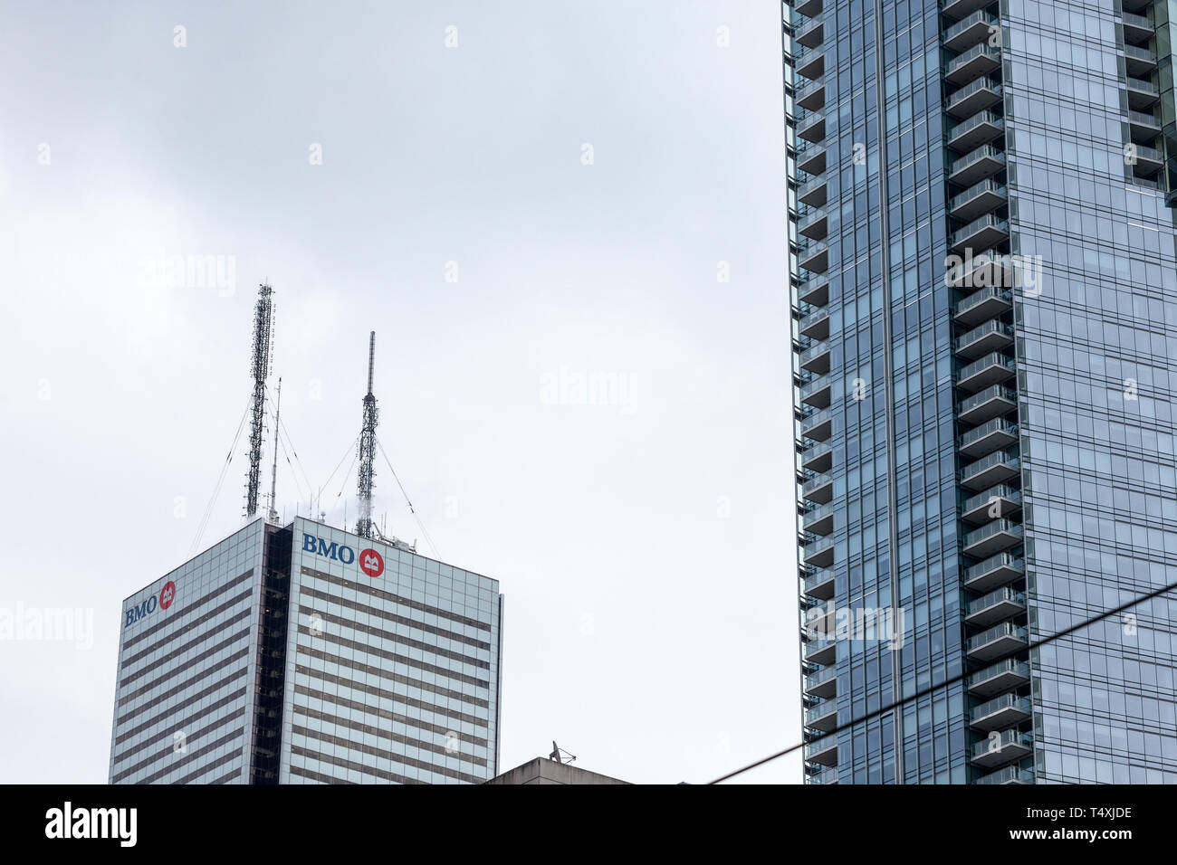 TORONTO, CANADA - NOVEMBER 13, 2018: Bank of Montreal logo, known as BMO, on of their headquarters in First Canadian Place tower Called as well banque Stock Photo