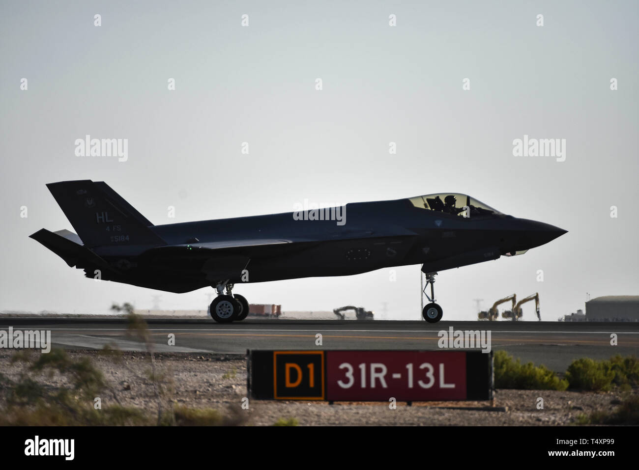 An F-35A Lightning II assigned to the 4th Expeditionary Fighter Squadron taxis down the runway at Al Dhafra Air Base, United Arab Emirates, April 15, 2019. This fleet of F-35’s are deploying to the U.A. Air Forces Central Command Area of Responsibility from the 4th Fighter Squadron at Hill Air Force Base, Utah, for the first time in U.S. Air Force history. (U.S. Air Force photo by Senior Airman Mya M. Crosby) Stock Photo