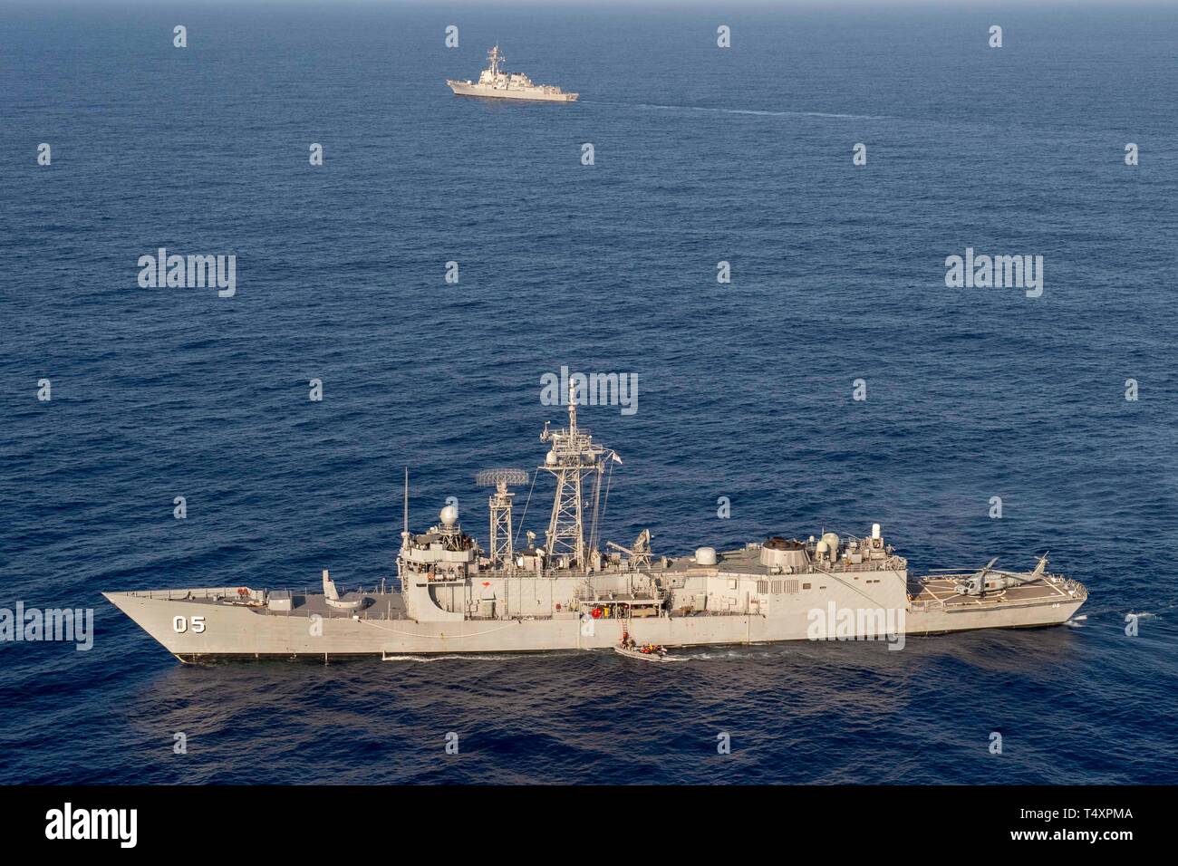 190418-N-UI104-0759     PHILIPPINE SEA (April 18, 2019) Sailors assigned to the Arleigh Burke-class guided-missile destroyer USS Preble (DDG 88) and the Royal Australian Navy Adelaide-class guided-missile frigate HMAS Melbourne (FFG 05) practice Visit Board Search and Seizer (VBSS) on each other’s vessels during a cooperative deployment. Preble and Melbourne are participating in a cooperative deployment in order to improve on maritime capabilities between partners.  Preble is deployed to the U.S 7th Fleet area of operations in support of security and stability in the Indo-Pacific region. (U.S. Stock Photo