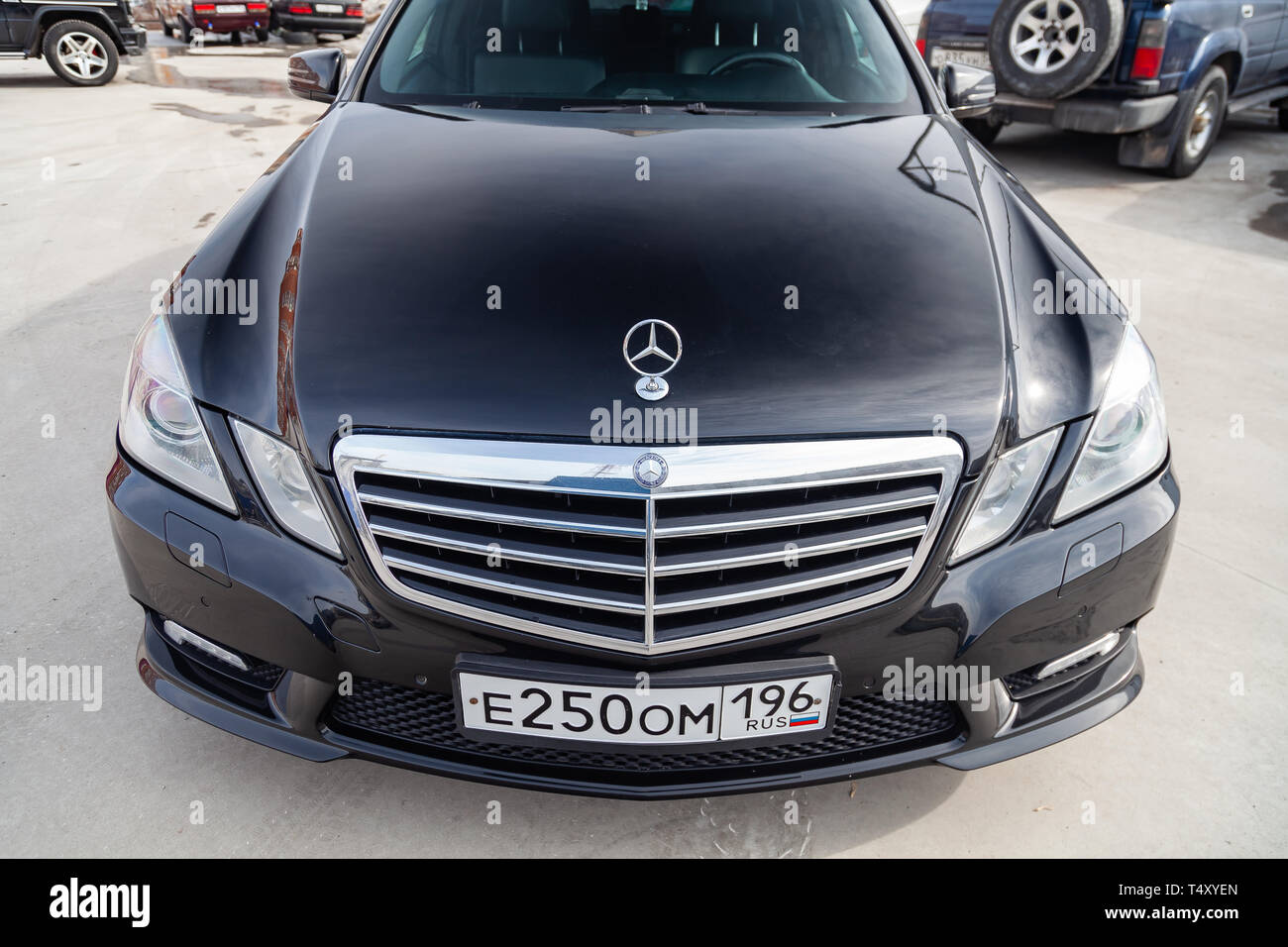 Nominal sand Investigation Novosibirsk, Russia - 04.12.2019: Black Mercedes Benz E-class E250 2010  year front view with dark gray interior in excellent condition in a parking  sp Stock Photo - Alamy