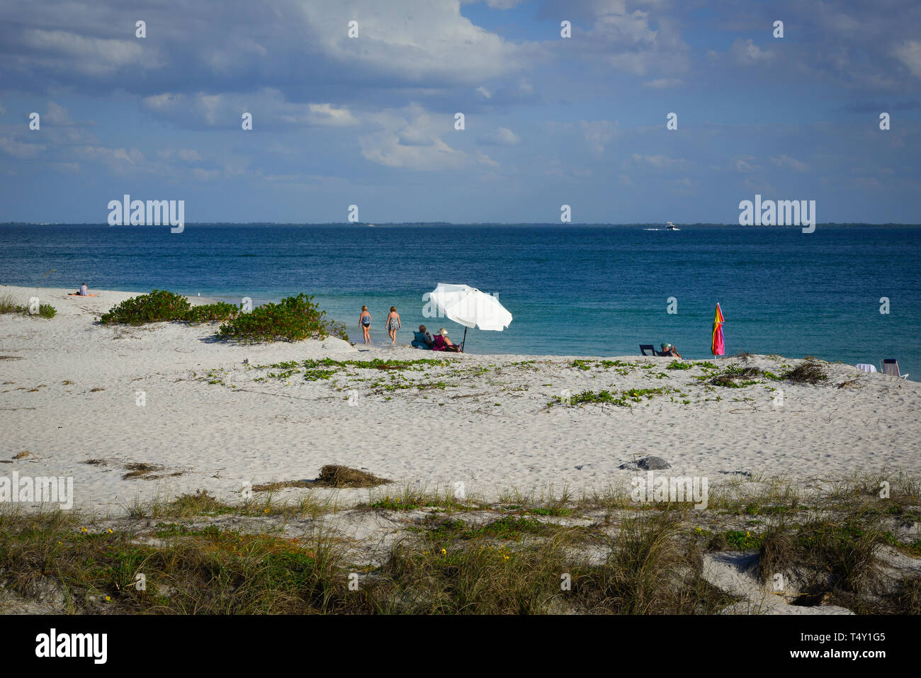 An overview of people enjoying the beach and blue water on Boca Grande, FL on Gasparilla island Stock Photo