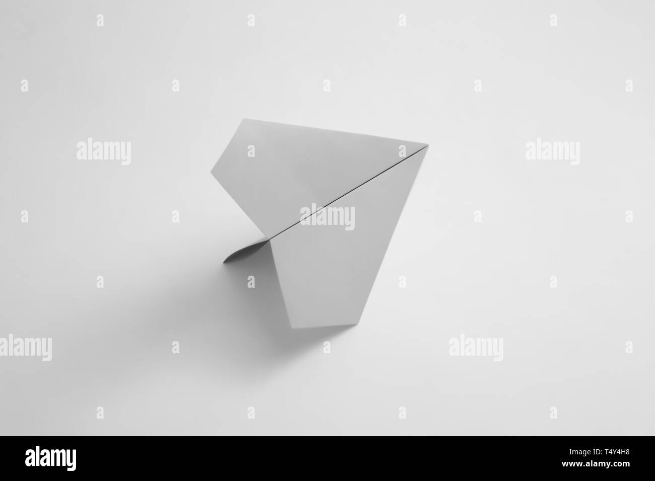 paper airplane on pastel background. Minimal flat lay school concept