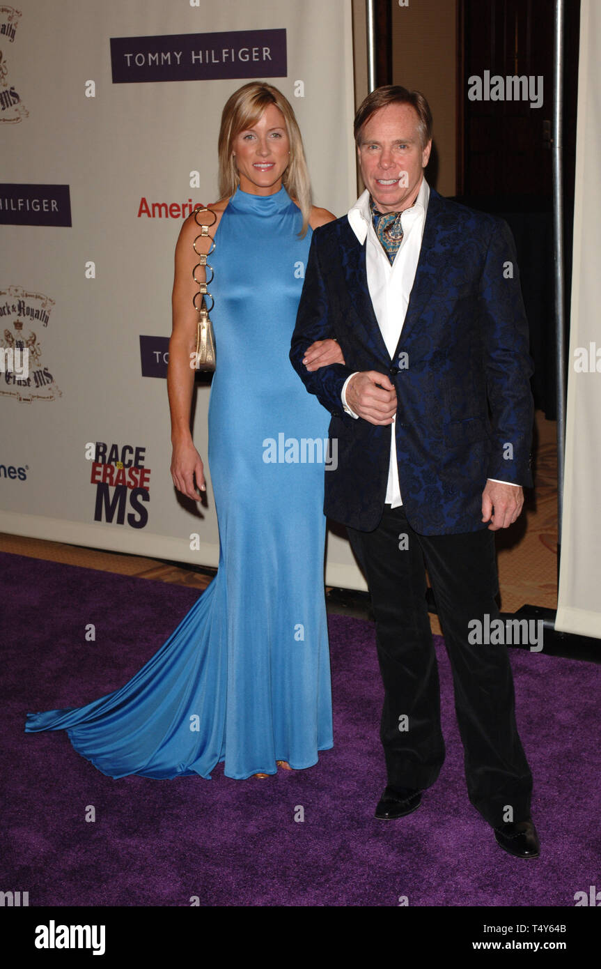 LOS ANGELES, CA. April 22, 2005: Designer TOMMY HILFIGER & girlfriend LIZZIE  SOMERBY at the 12th Annual Race to Erase MS Gala themed 