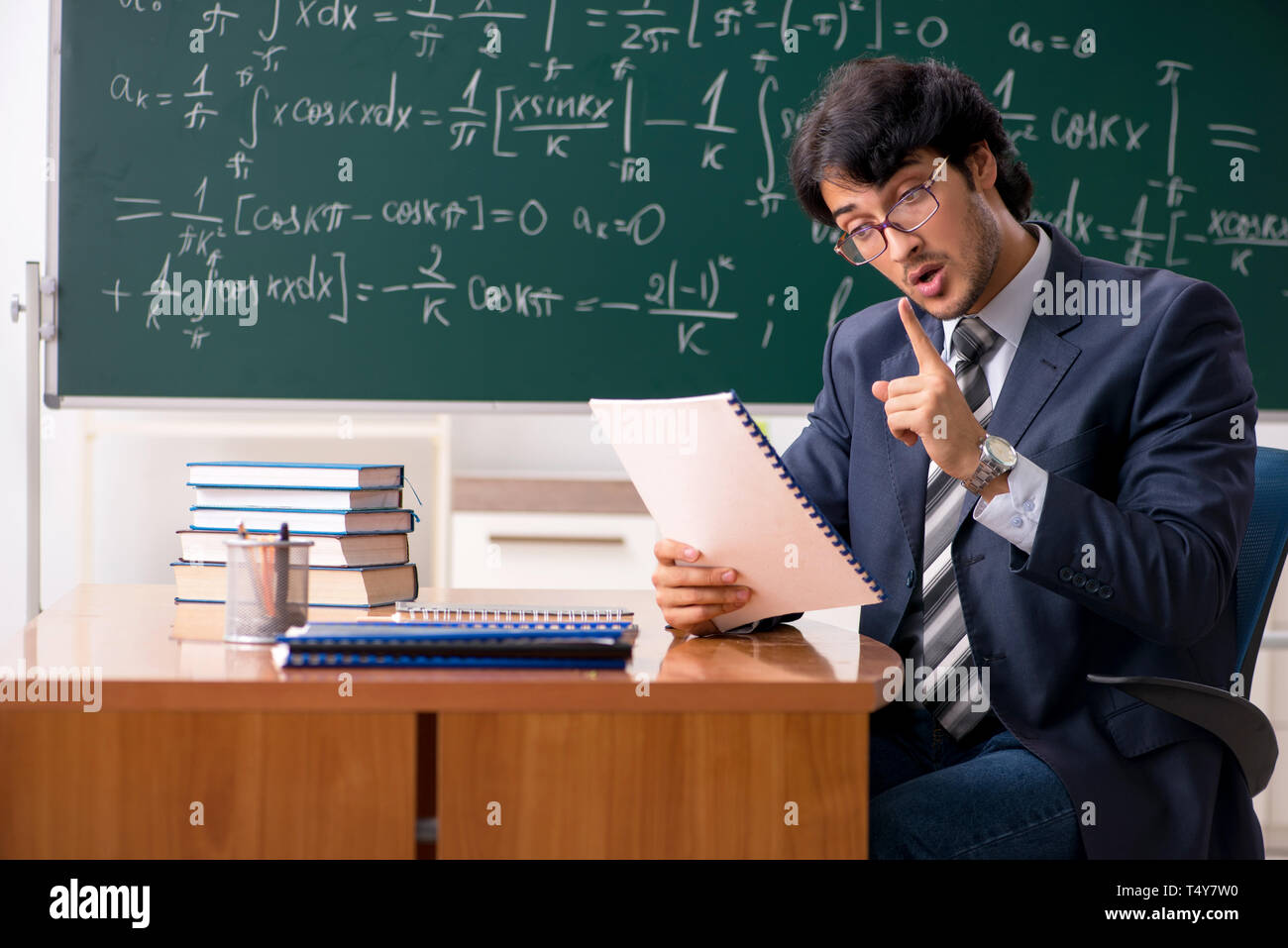 Student Looking At Math Student looking mathematical formulas hi-res stock photography and ...