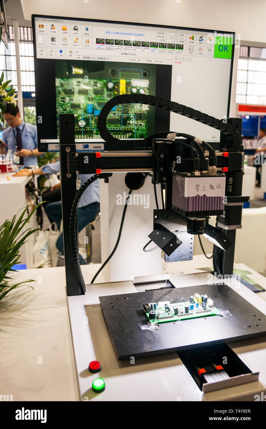 An EOC auto checking microscope checking at circuit board at the 2019 China International Technology Expo held in Shenzhen. Stock Photo