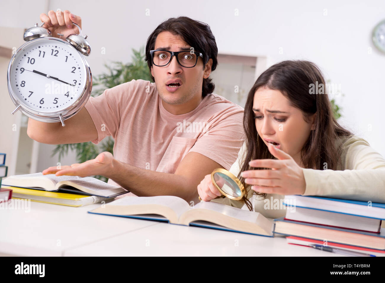 Students preparing for exam together at home Stock Photo - Alamy