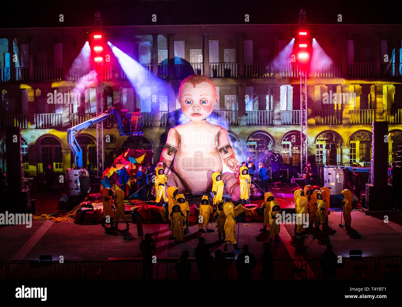A dress rehearsal for Zara, a huge outdoor theatre production featuring a  Giant baby, at the Piece Hall in Halifax, Yorkshire Stock Photo - Alamy