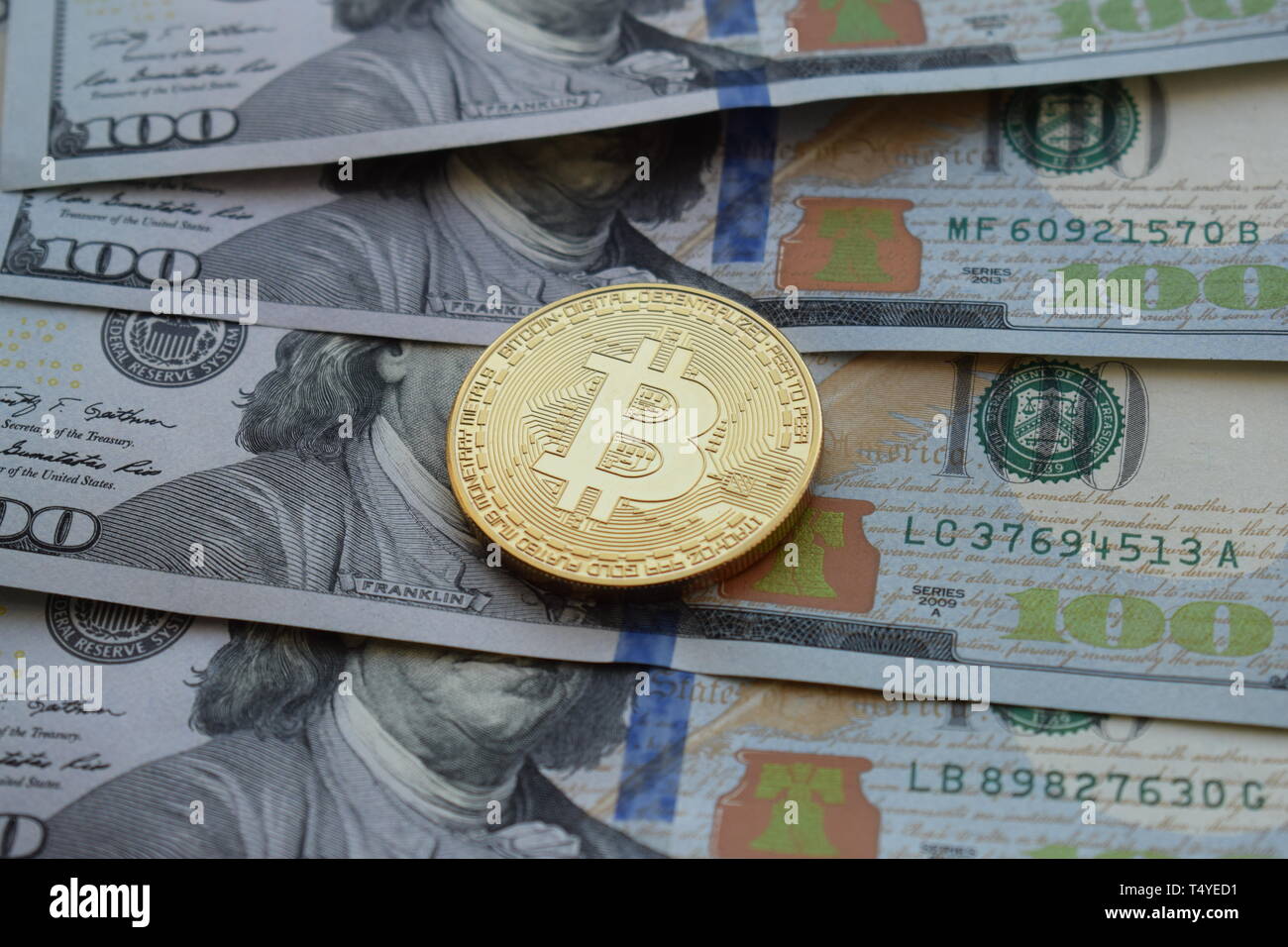 One hundred dollars coins hi-res stock photography and images - Alamy