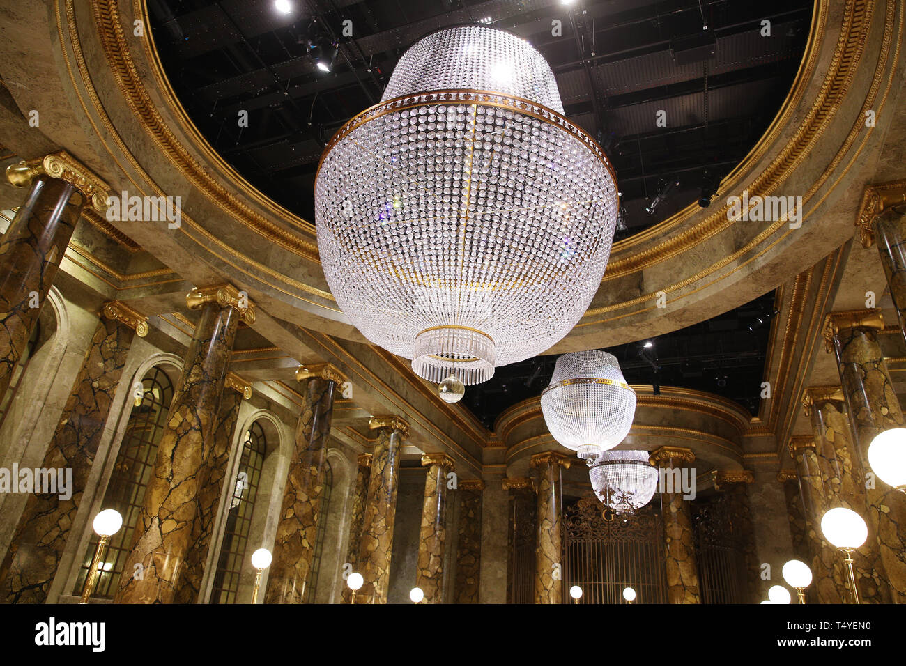 Warwick Davis With James And Oliver Phelps Attend The Reveal Of