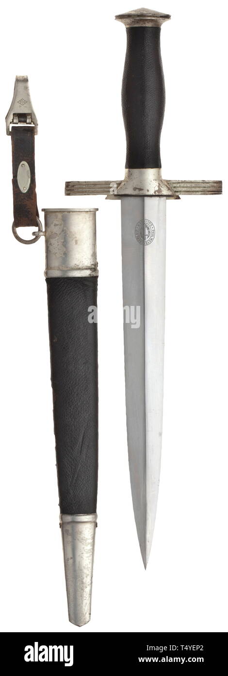 A dagger M 36 for leaders with leather hanger. The blade with etched maker's mark of Paul Weyersberg, Solingen. Pommel and quillons silvered (faded), black-leathered grip and partly enamelled (small flaws) emblem. Black-leathered iron scabbard (one locket screw missing, small leather defects), the fittings with vestiges of silvering. Leather hanger, the fittings (marked OLC) with remnants of silvering. Length 39.5 cm. In beautiful, original condition. historic, historical, Reichsluftschutzbund, State Air Protection Corps, organisation, organization, organizations, organisat, Editorial-Use-Only Stock Photo