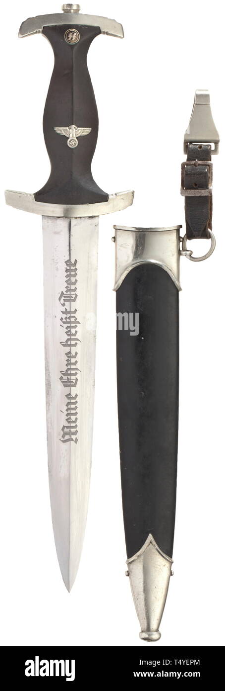 A service dagger M 33 with leather hanger. Good blade with etched devices, maker Rich. Abr. Herder, Solingen. Nickel silver grip fittings, the quillons punched 'I'. Black wood grip with inset nickel silver eagle and enamelled SS emblem, black painted steel scabbard with nickel silver fittings (the terminal button of scabbard pushed in), the leather hanger with part of the vertical hanger. Length circa 37 cm. historic, historical, 20th century, 1930s, 1940s, Waffen-SS, armed division of the SS, armed service, armed services, NS, National Socialism, Nazism, Third Reich, Germa, Editorial-Use-Only Stock Photo