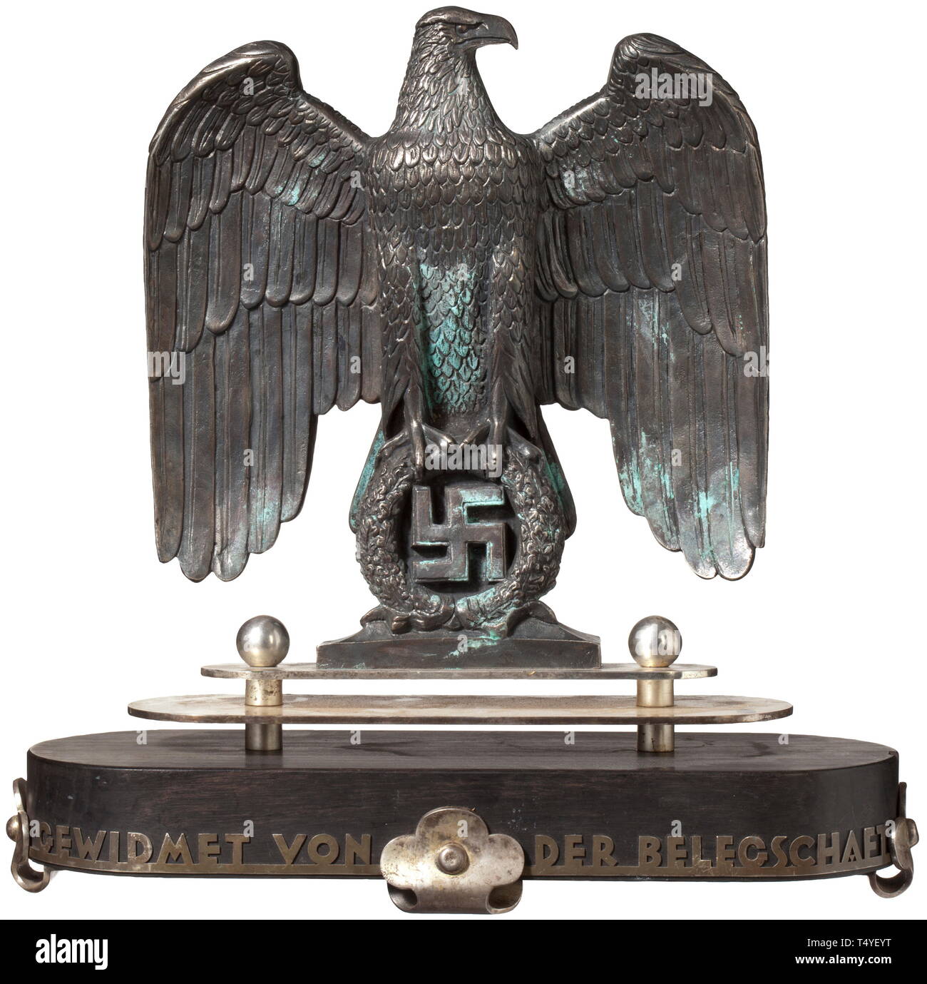 Professor Kurt Schmid-Ehmen (1901 - 1968) - a silvered bronze eagle in the shape of the eagle at the Luitpold Arena on the Nazi party rally grounds in Nuremberg. Bronze, silvered, monogrammed laterally 'K.S.E.'. The multi-piece, silvered resp. ebonised base with the presentation inscription 'Gewidmet von der Belegschaft' (Bestowed by the staff). Detailed miniature sculpture. Height 26 cm, total height 35 cm. The silvering probably later or renewed. Modelled on the seven-metre tall original at the Nazi party rally grounds. Prof. Kurt Schmid-Ehmen, the 'eagle maker', is consi, Editorial-Use-Only Stock Photo
