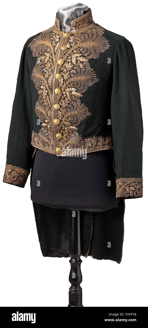 A livery for a high court attendant about 1900. Frock coat of fine green woollen cloth, gilt buttons worked in relief with crowned, double-headed eagles, richly gilt embroidery, the collars and cuffs with black velvet underlay, on the reverse right pocket a chamberlain's key-portepee. Black silk liner. A few moth holes, repairs and age marks. historic, historical, Imperial, Austria, Austrian, Danube Monarchy, Empire, 20th century, Additional-Rights-Clearance-Info-Not-Available Stock Photo