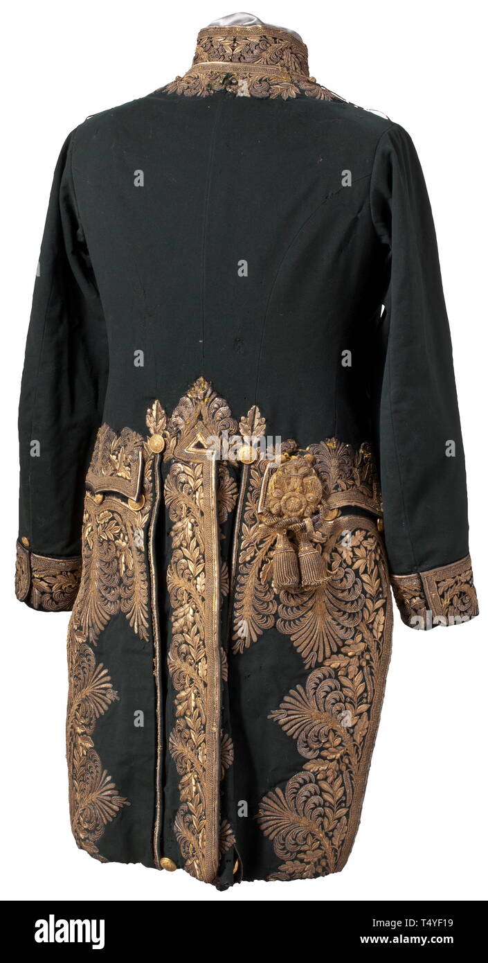 A livery for a high court attendant about 1900. Frock coat of fine green woollen cloth, gilt buttons worked in relief with crowned, double-headed eagles, richly gilt embroidery, the collars and cuffs with black velvet underlay, on the reverse right pocket a chamberlain's key-portepee. Black silk liner. A few moth holes, repairs and age marks. historic, historical, Imperial, Austria, Austrian, Danube Monarchy, Empire, 20th century, Additional-Rights-Clearance-Info-Not-Available Stock Photo